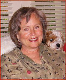 Photo portrait of Giuliana Reed with her sweet dog Scout on her shoulders